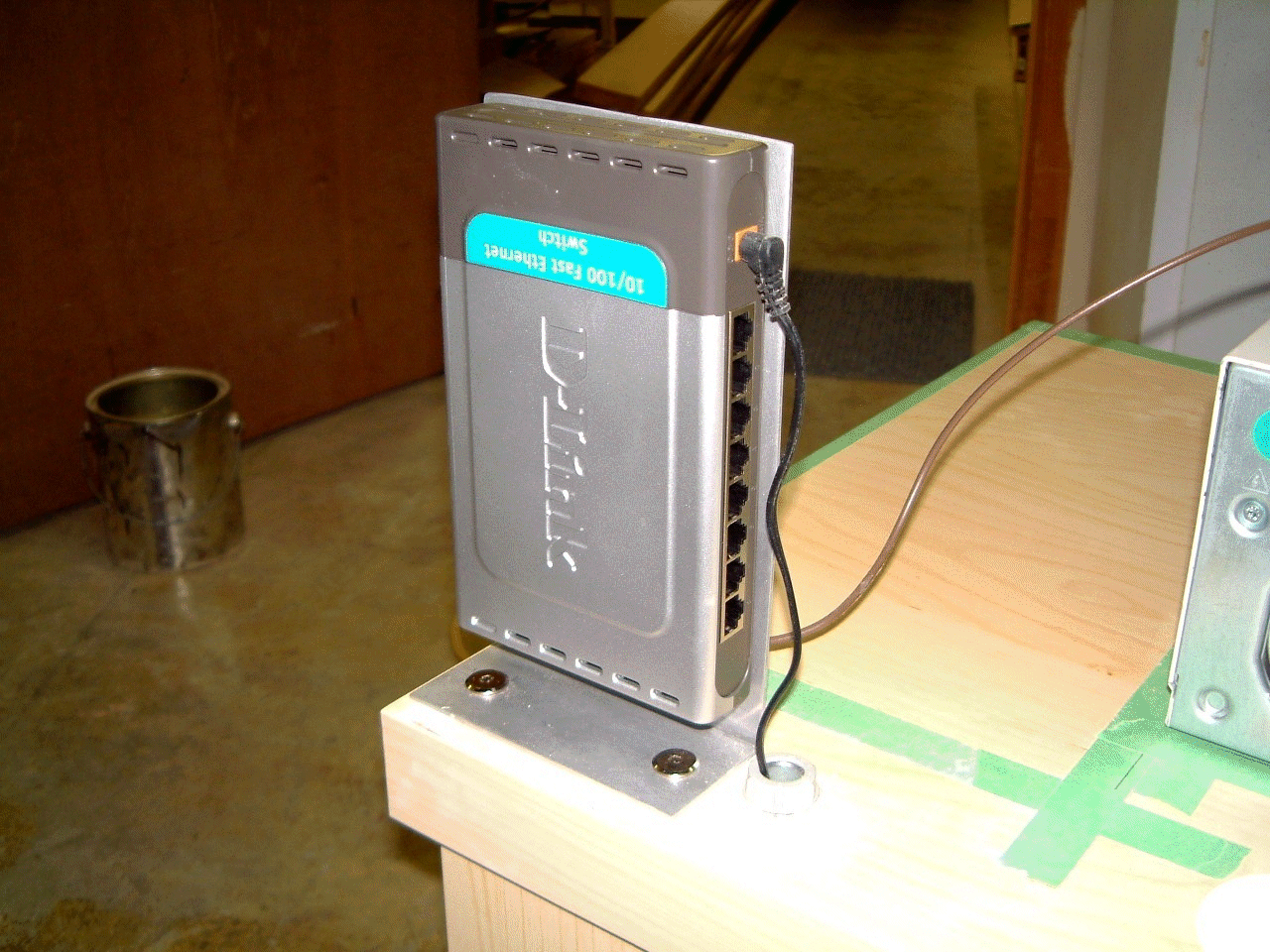 Description: Vertically mounted D-Link unit - on new computer cart